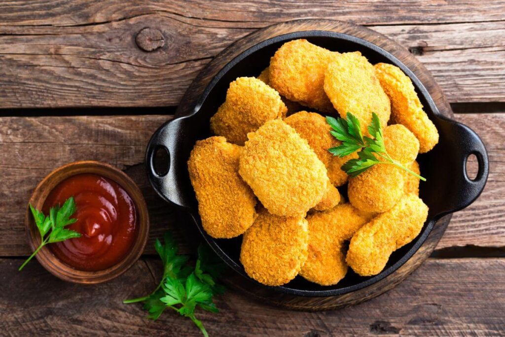 Zdrowe nuggetsy z kurczaka bez tłuszczu z air fryera Frytkownica beztłuszczowa - przepisy. Domowe nuggetsy z kurczaka