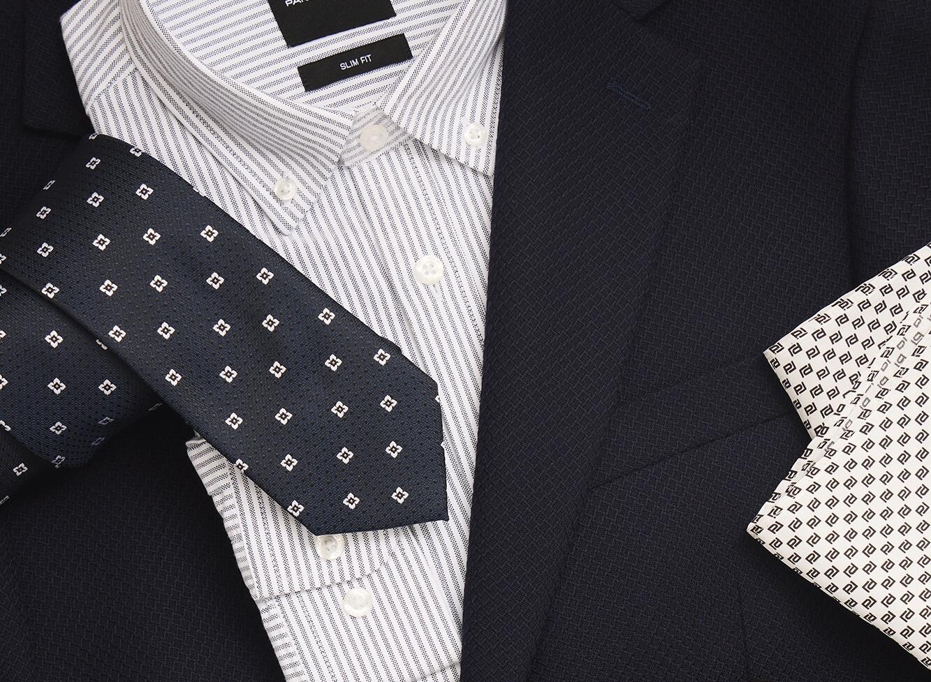 Spodnie garniturowe – jakość, która buduje wizerunek